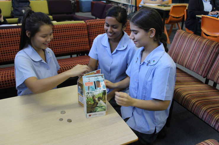 Students from Delany College, Granville have been generously donating to Project Compassion, raising over $2000. From left to right: Year 11 students Hilary Lim, Divashna Kumar and Elisar Salameh busy counting the coins. Students from Delany College, Granville have been generously donating to Project Compassion, raising over $2000. From left to right: Year 11 students Hilary Lim, Divashna Kumar and Elisar Salameh busy counting the coins.